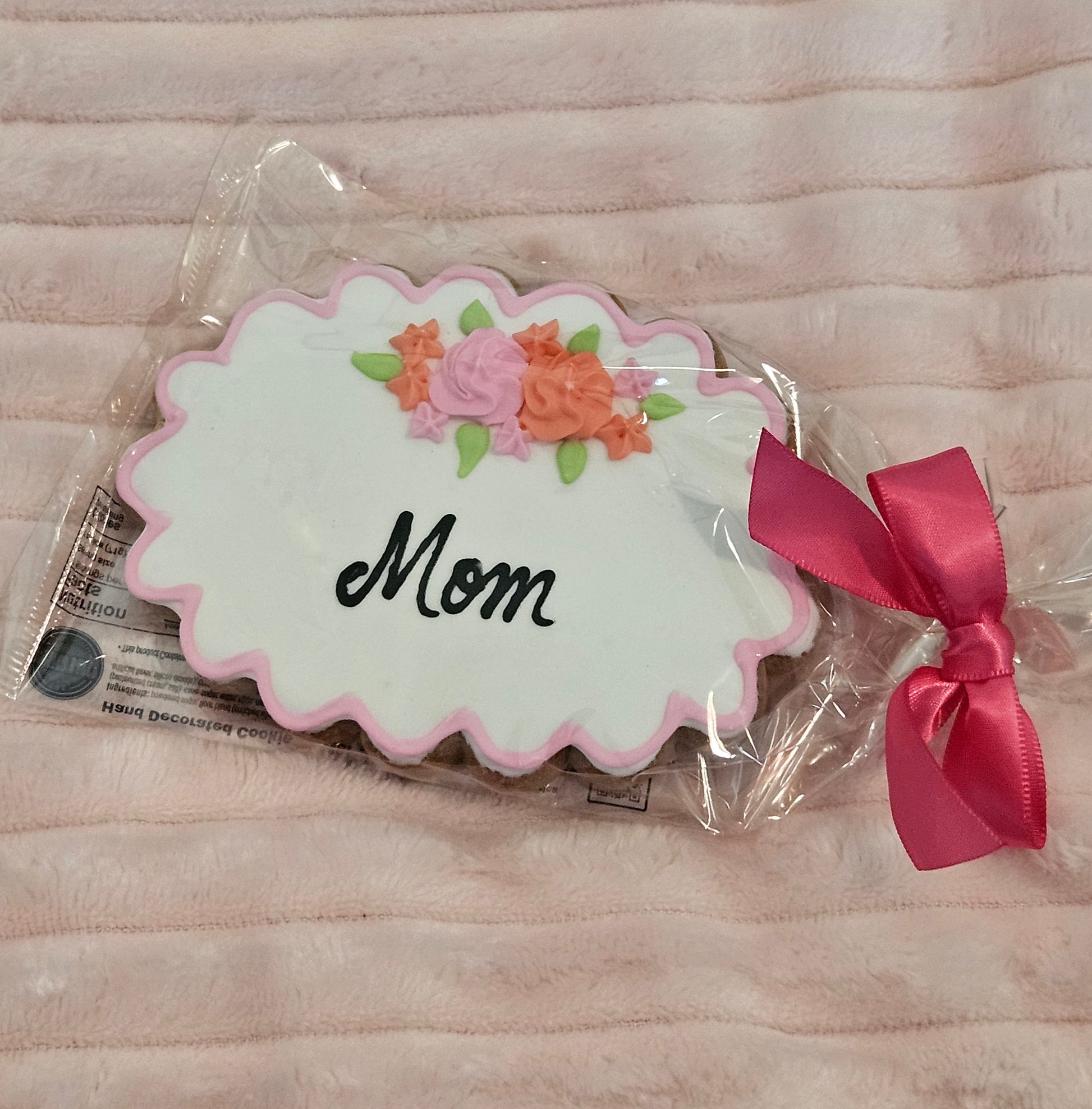 mom mother's day cookie on fuzzy pink throw